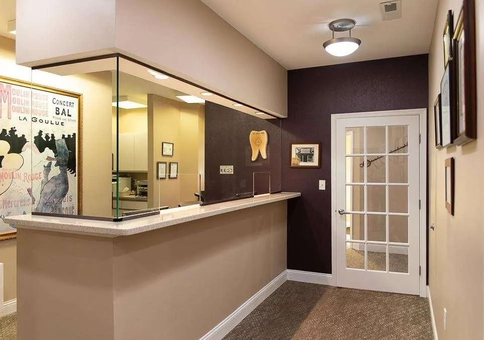 The front desk at Rehoboth Beach Dental, beside the door through to the treatment rooms.